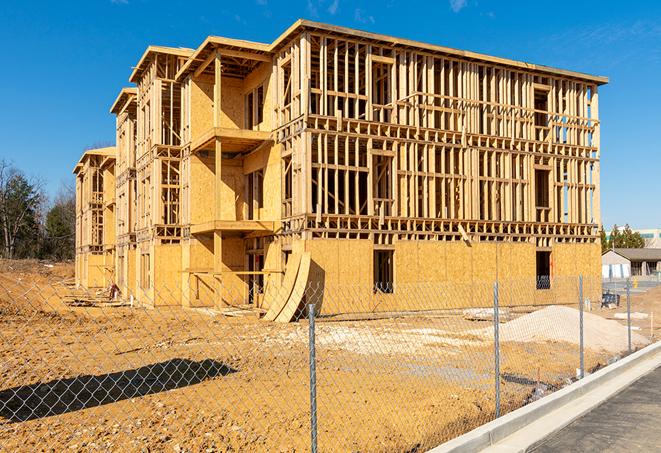 a snapshot of temporary chain link fences protecting a large construction project from unauthorized access in Green Valley, AZ